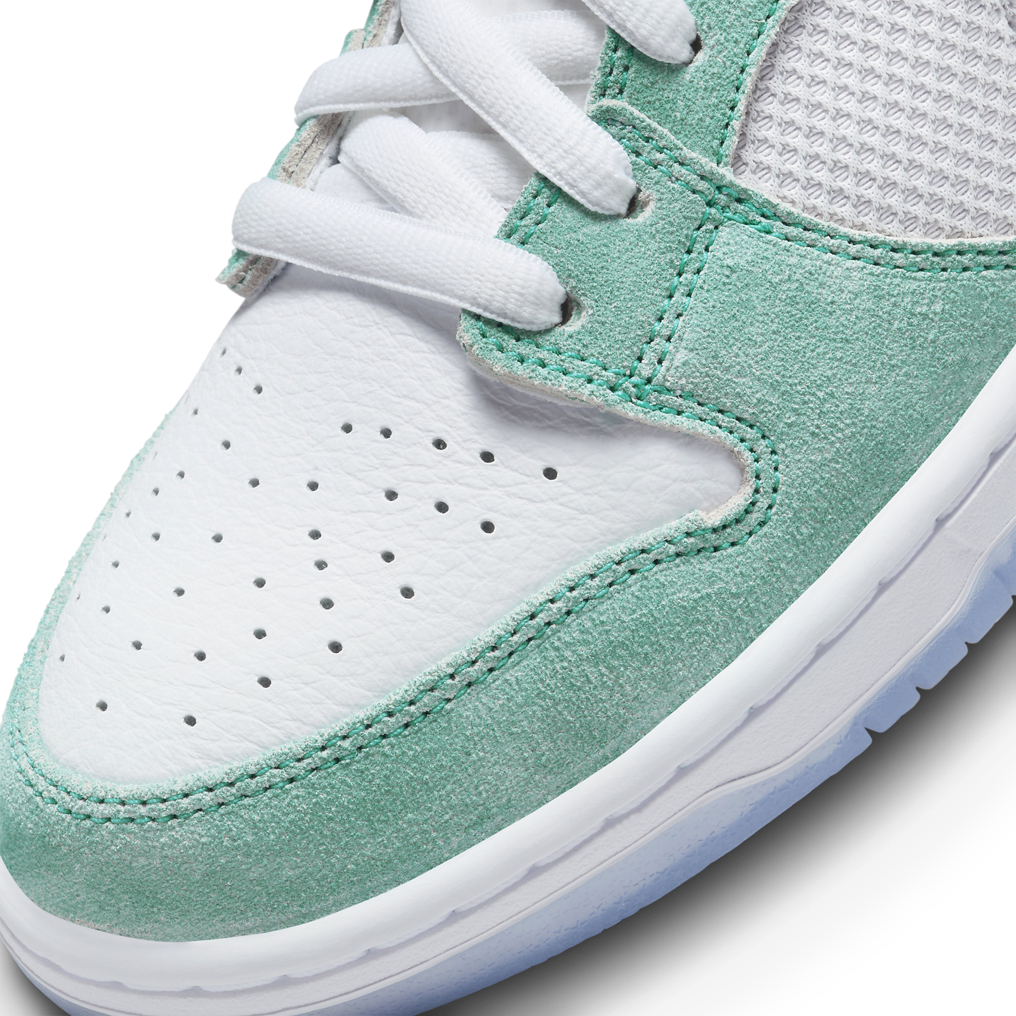 Toe box side view of April Skateboards x Nike SB Dunk Low Turbo Green FD2562-400